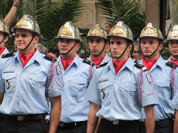 Fire fighters wear shiny helmets in Lyon