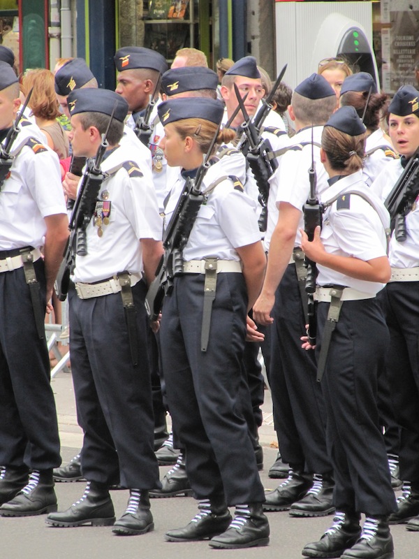 Soldiers waiting with weapons in hand