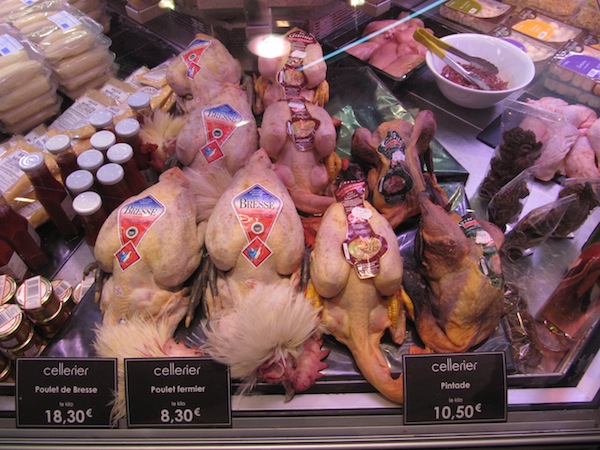 Bresse chicken complete with heads