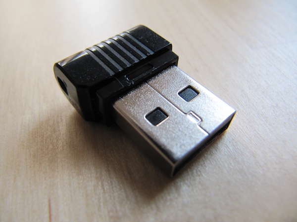 The tiny 16GB USB drive close up; the connector is larger than the electronics.