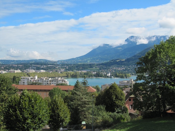 Lake Annecy is visible from the basilique; views in other directions are blocked by trees.