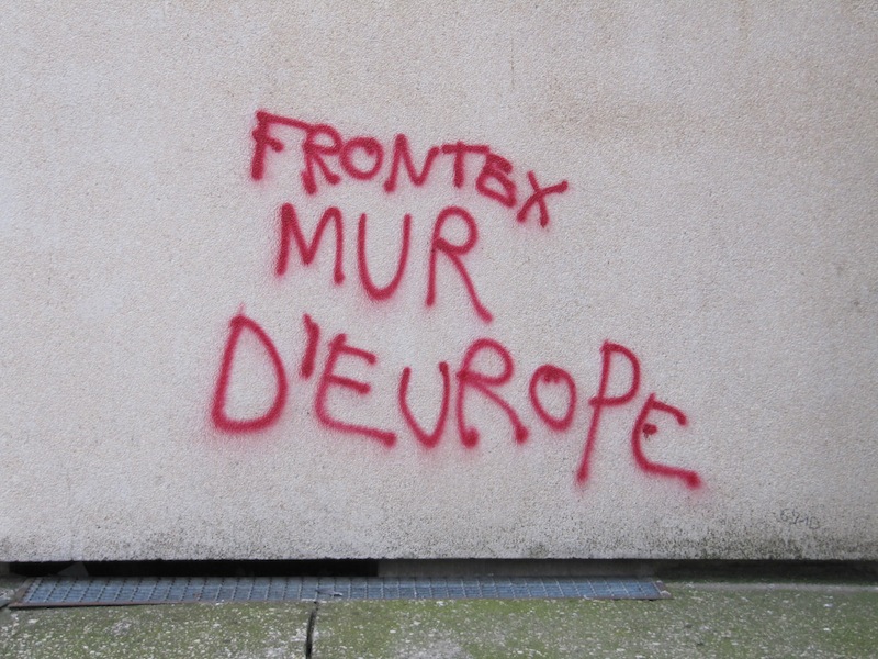 Political graffiti reads &ldquo;frontex mur d&rsquo;europe&rdquo;