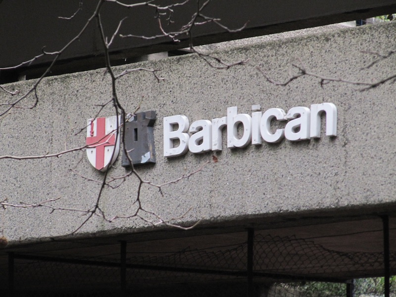 Barbican sign and coat of arms