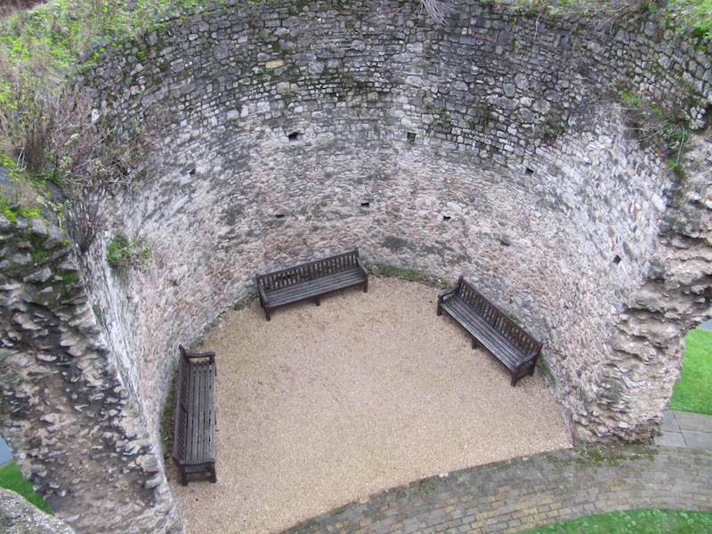 Three seats within a section of the London wall