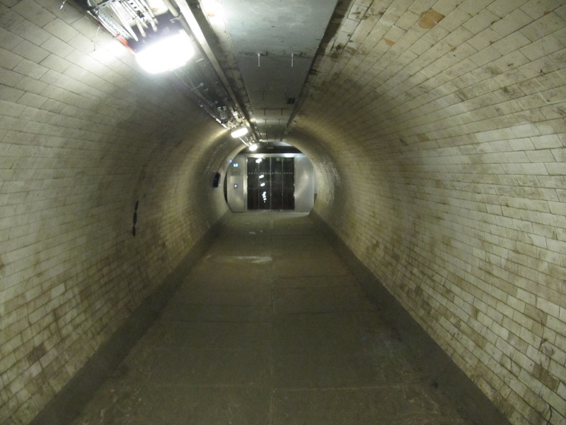 Tiled walls of Greenwich foot tunnel leading to the lift