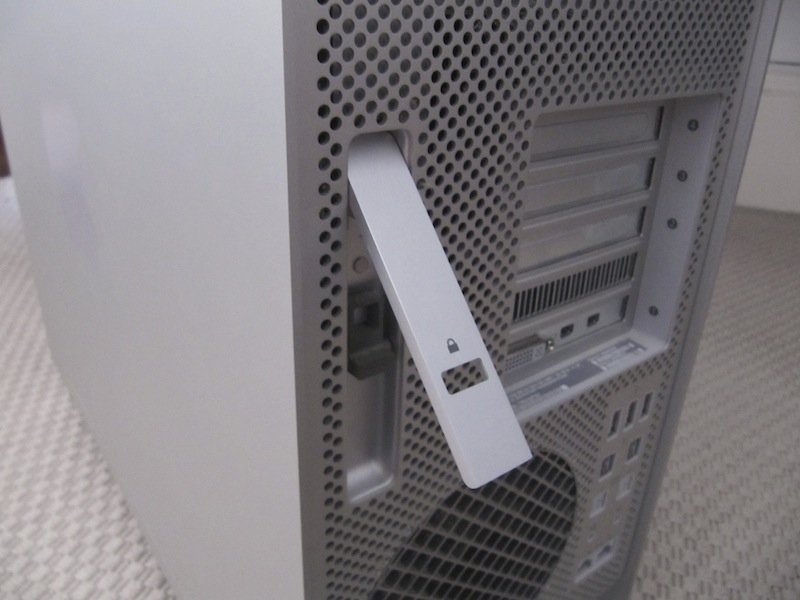Flip the latch to unlock the side of the Mac Pro