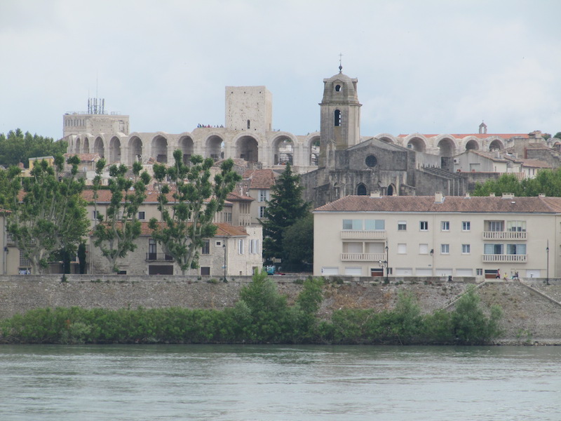 Coliseum and church viewed from over the river