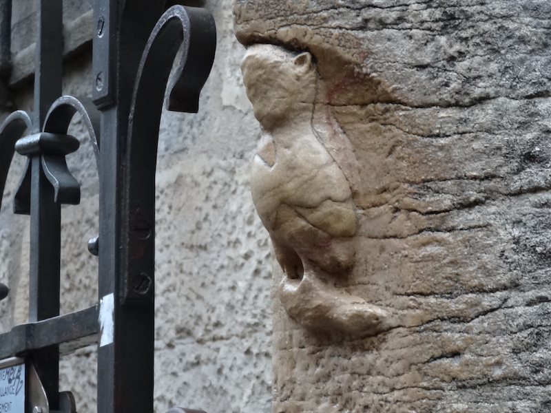 An owl carved into a church; rubbing it is believed to impart good fortune