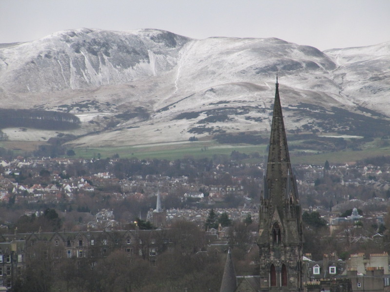 Close up of the snowy hills from Edinburgh Castle