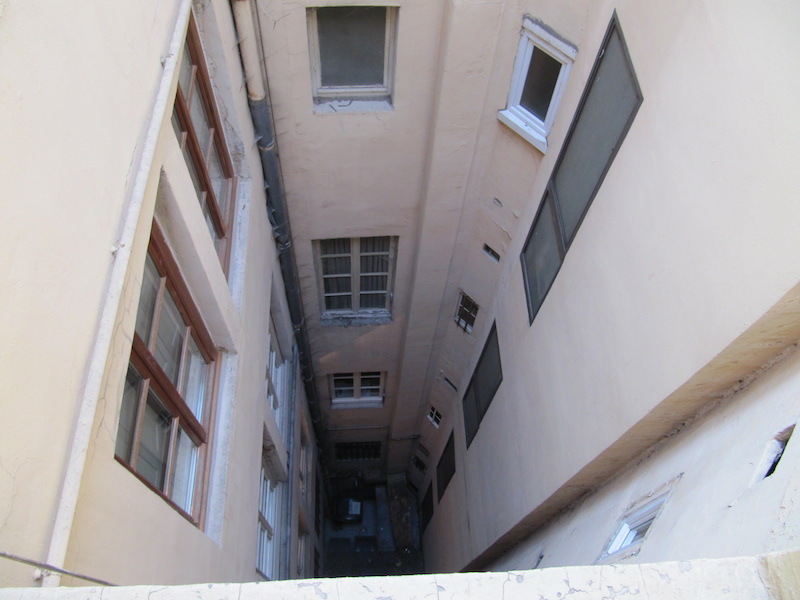 Looking down the shrunken courtyard