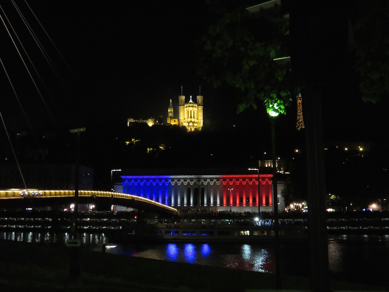 After the fireworks, France&rsquo;s flag colours are projected onto the Halls of Justice.