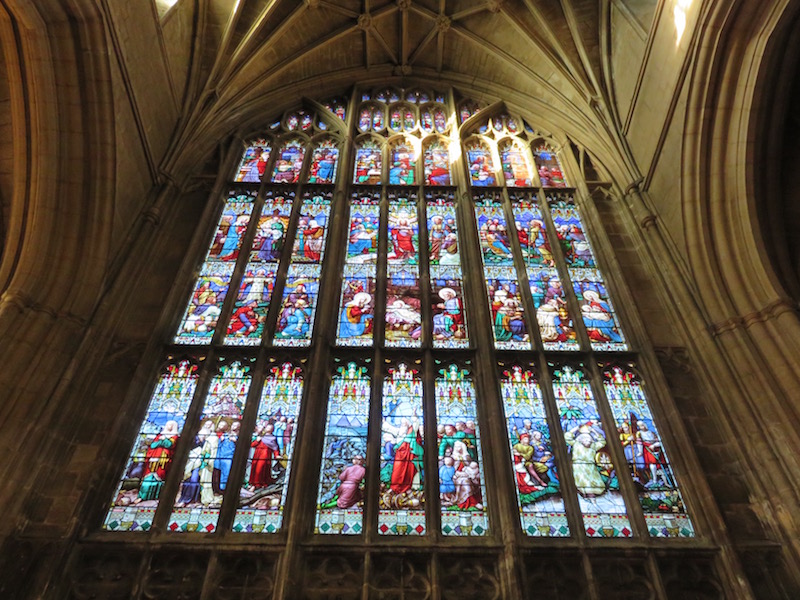 Towering stain glass window inside Gloucester cathedral