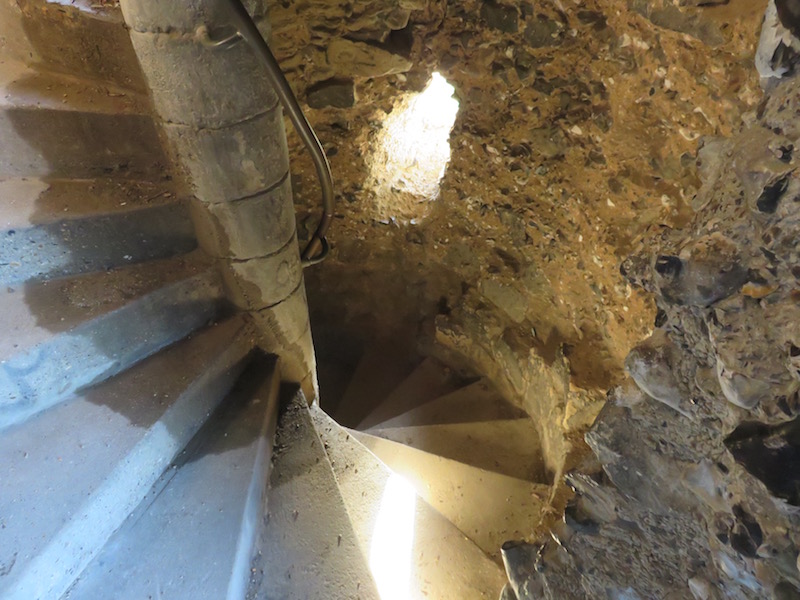 Stairwell within a ruined castle.
