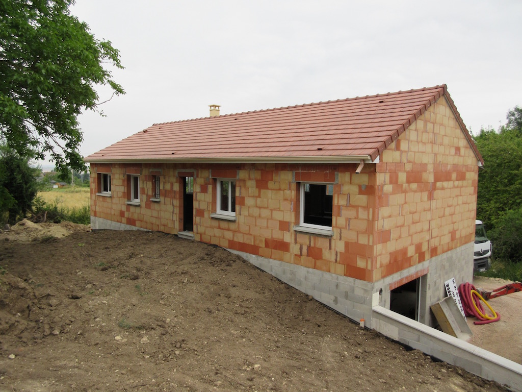 Build week 24: We can go through the front door now the soil has been backfilled around the house