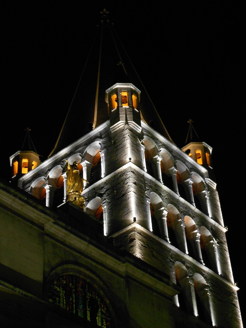 A church tower with dramatic lighting