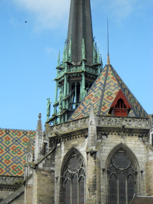 Brightly patterned rooftops appear all around Dijon